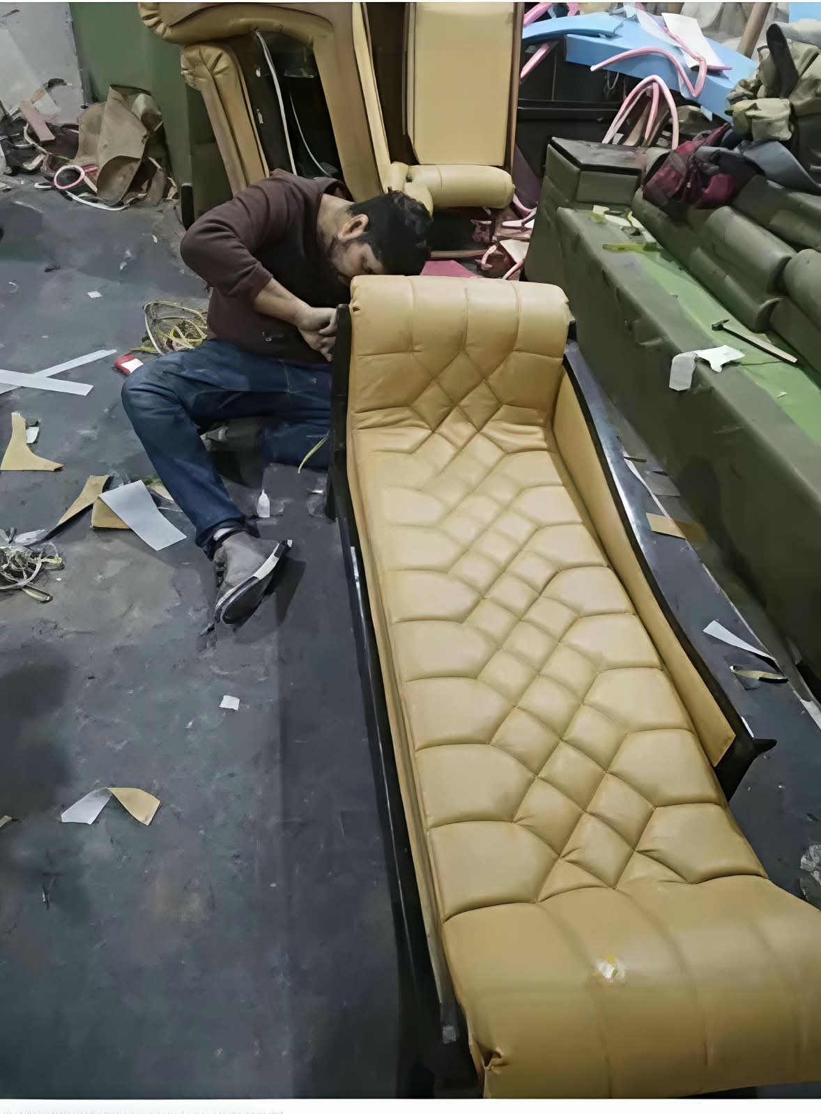 Sofa repair cost in Noida - Diamond Sofa Repair craftsman repairing a sofa in our workshop
